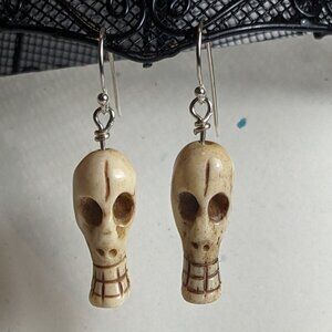 Hand-made carved bone skull earrings on sterling silver ear wires. New!